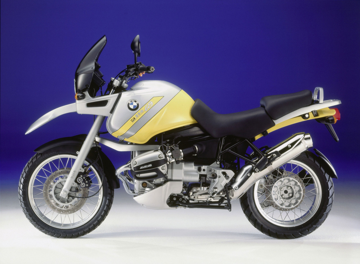silver and yellow BMW motorcycle