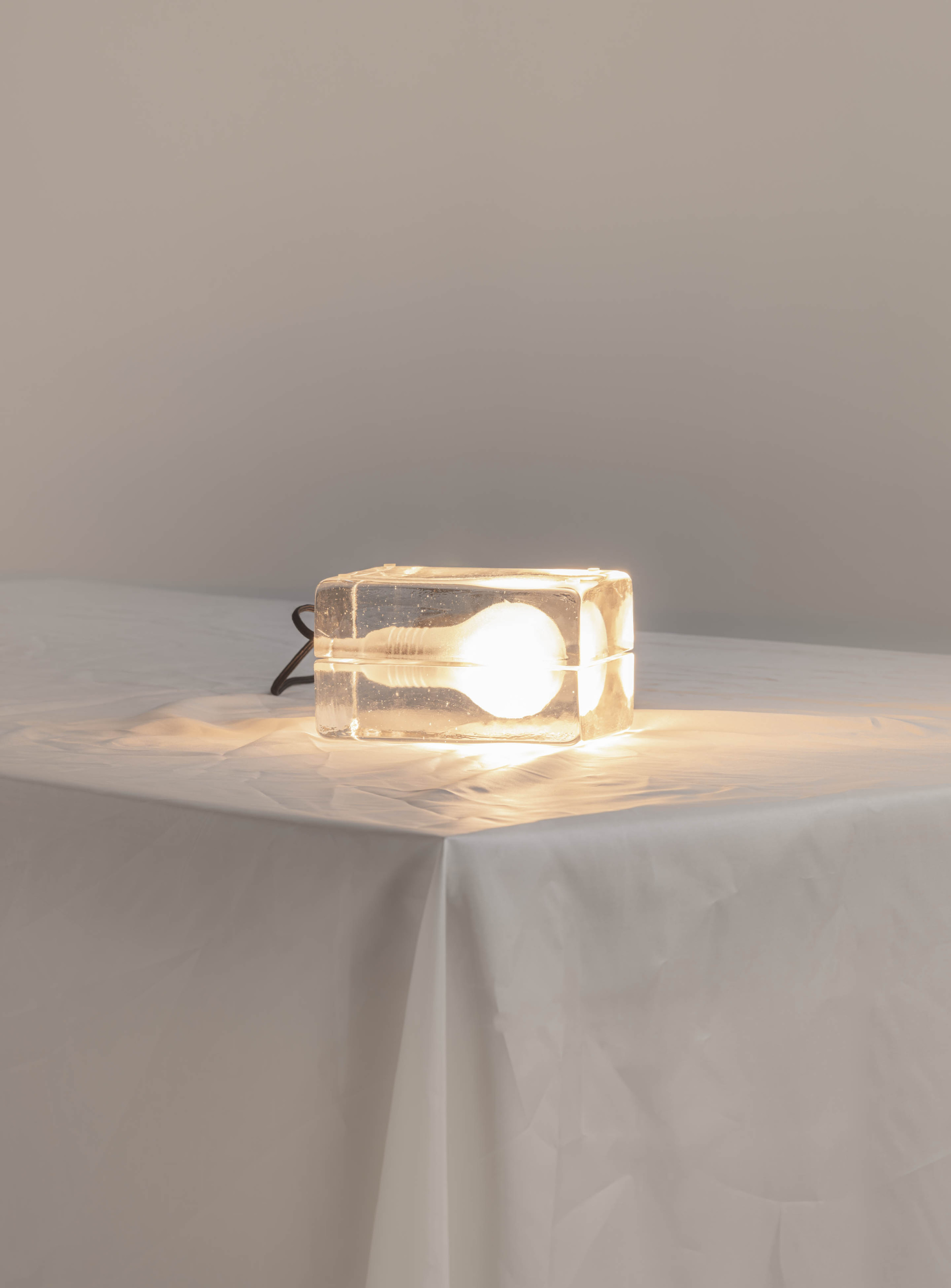 Harri Koskinen's Block Lamp Freezes a Lightbulb in Ice