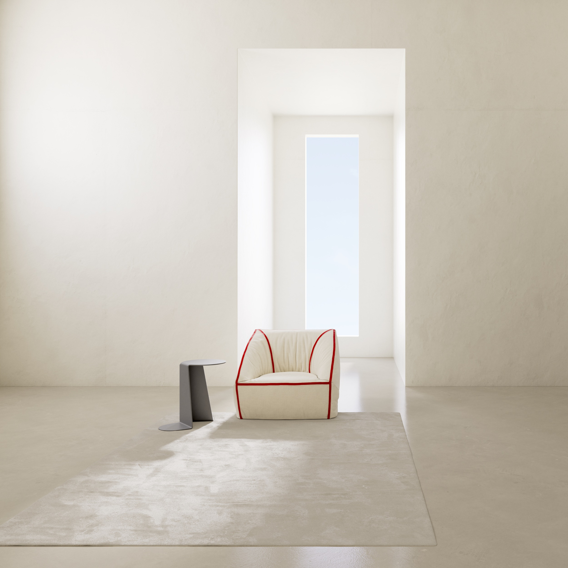 Faye Toogood Crease armchair and metal coffee table for Meritalia