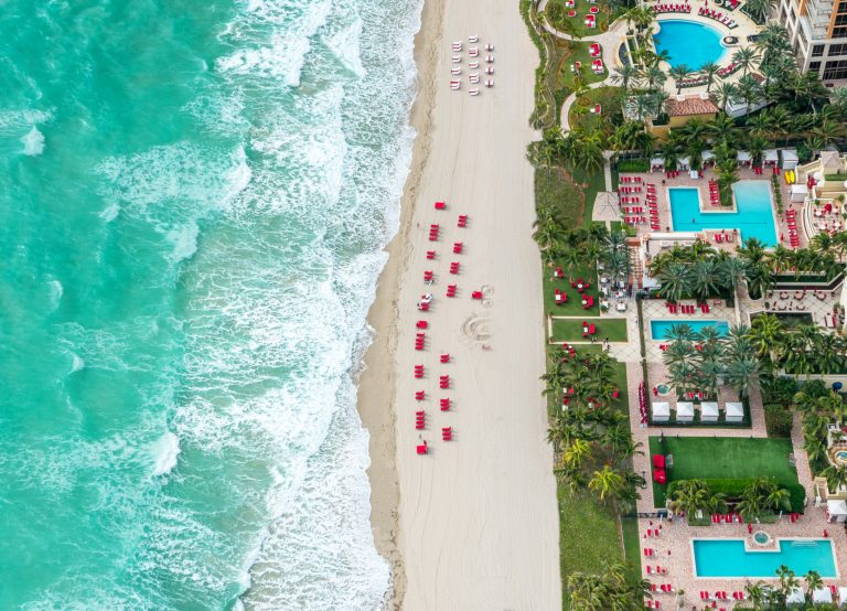 A drone image of the beach at acqualina resort