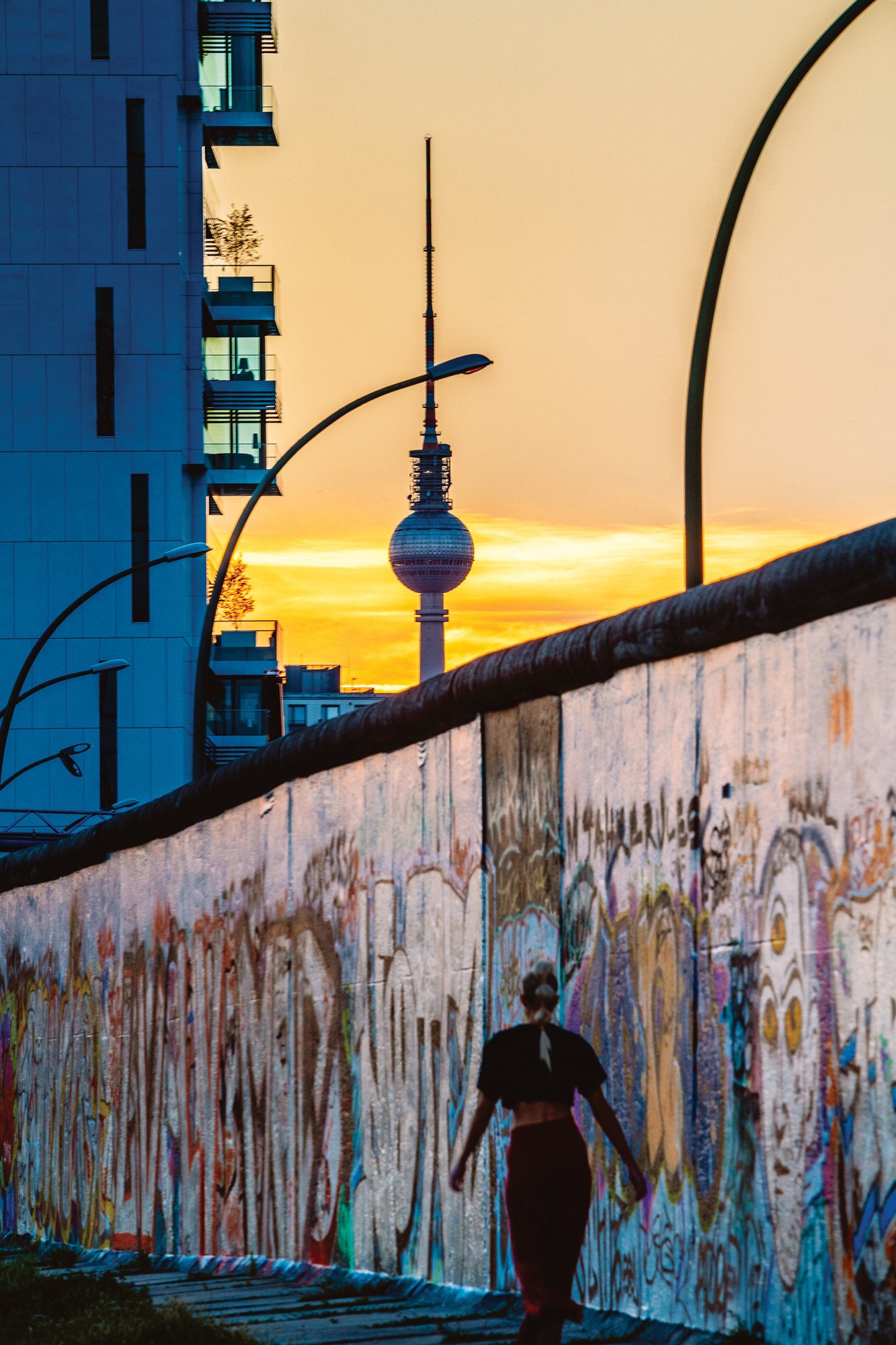 sixtysix mag on the road berlin wall sunset