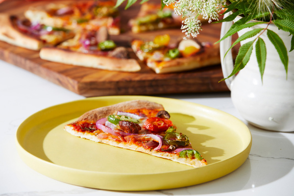 sixtysix mag pizza slice yellow plate